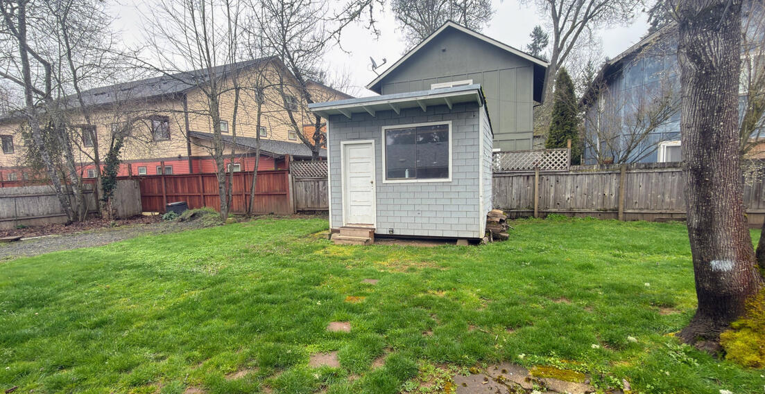 Sturdy Shed in Large Backyard